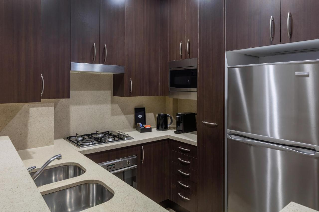 Meriton Suites Pitt Street, Сідней Екстер'єр фото A typical kitchen in a serviced apartment